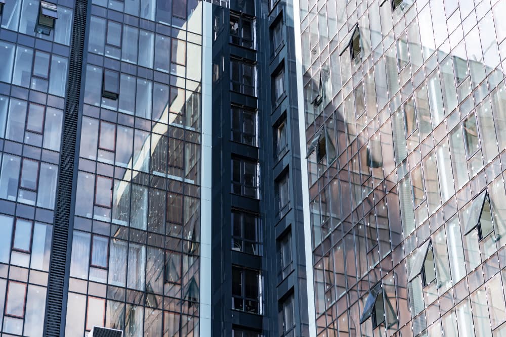 Glass curtain wall facade of a high-rise building